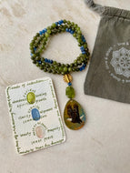 Seeds of Intention Mala | Peridot, Kyanite + Mother of Pearl