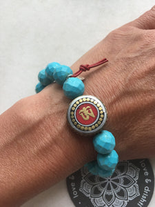 Tibetan Om with red leather